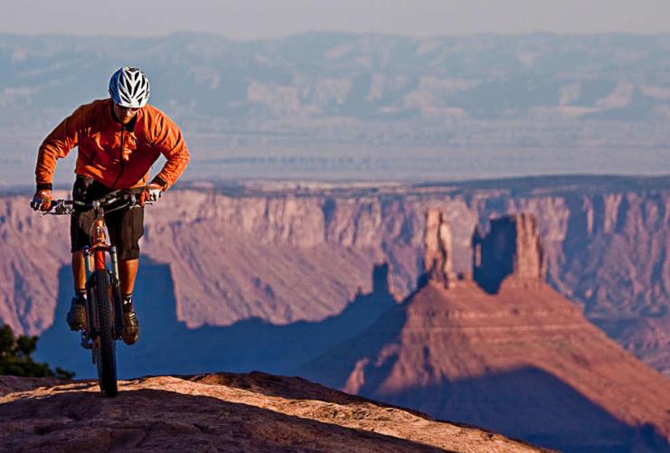 Single mountain biker at Bartlett Wash Moab