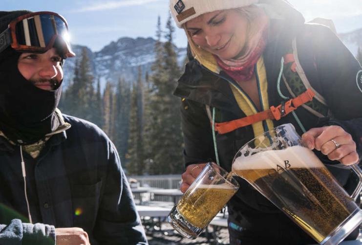 Skiers taking a break for drinks at Alta Ski Resort