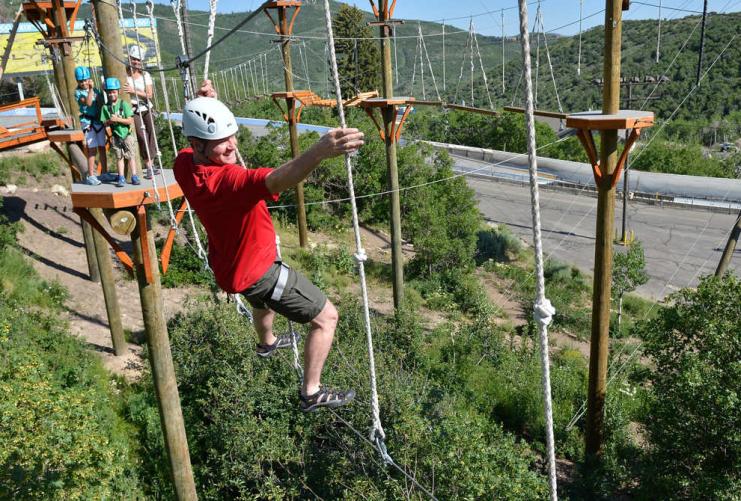 Man on ropes course at Park City Olympic Park