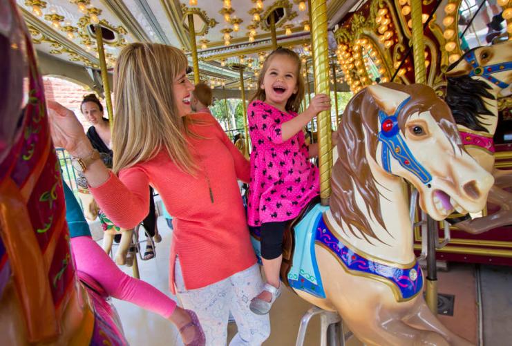 Young Girl on Carousel at Lagoon Amusement Park