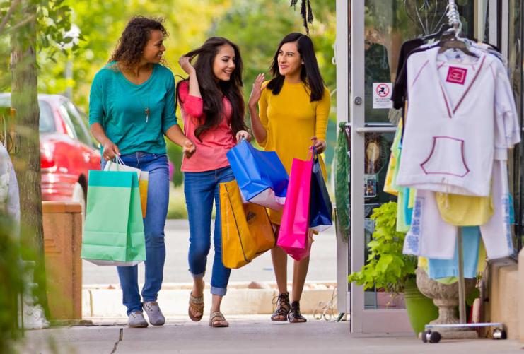 Women walking together after shopping