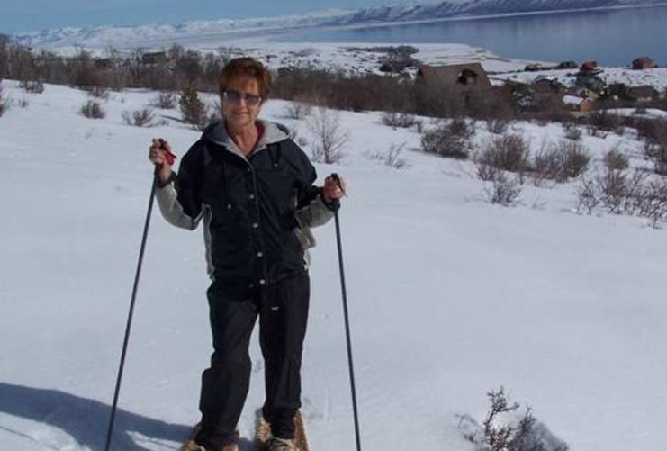 Woman on snowshoes at Bear Lake