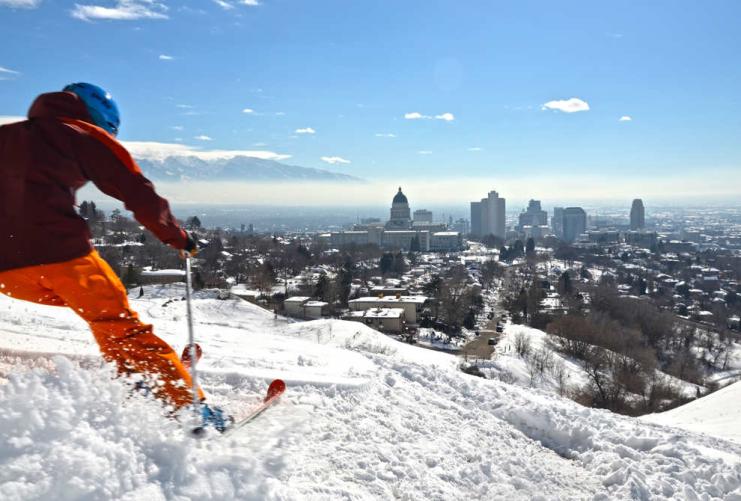 Skier in foothills above downtown Salt Lake