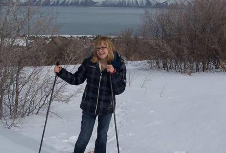 Girl snowshoeing at Bear Lake Utah
