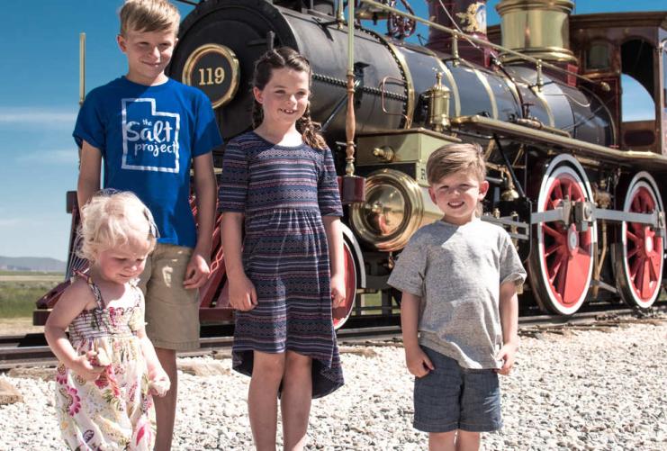 Kids in front of train at Golden Spike Historic Site
