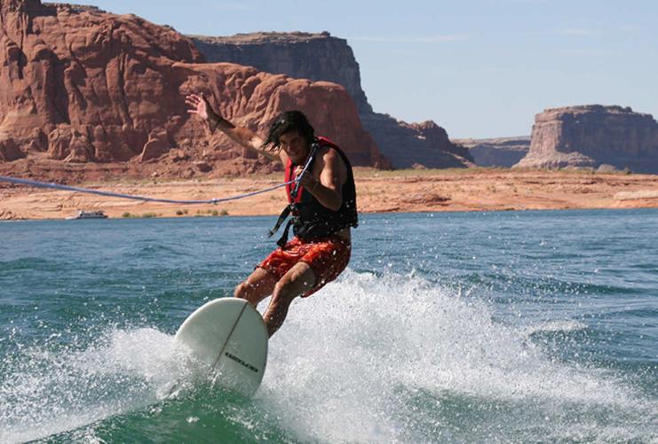 Person wake surfing in Lake Powell Utah