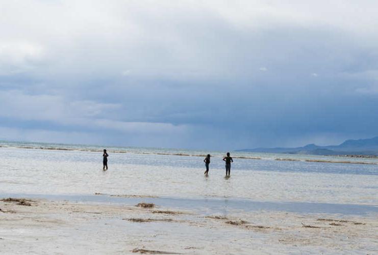 People wading in water Antelope Island