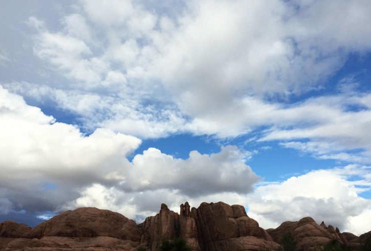 Red Rock Outcrop with Cloudy Sky