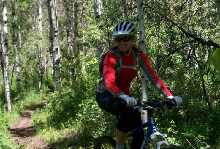 Female Mountain Biker in the Mountains
