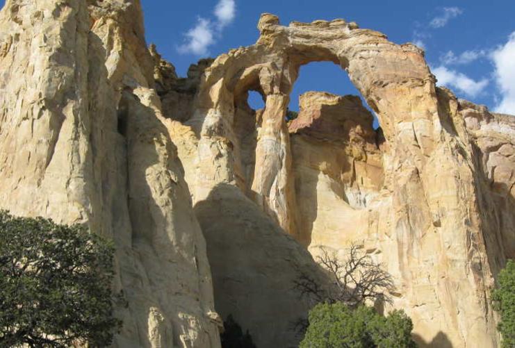 Grosevenor Arch is a large sandstone arch located in the Grand Staircase National Monument in Southern Utah.