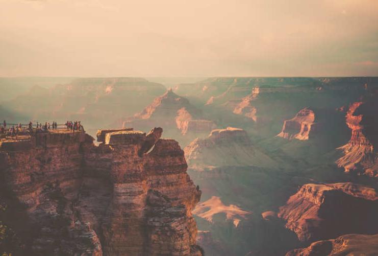 People standing at the Grand Canyon overlook