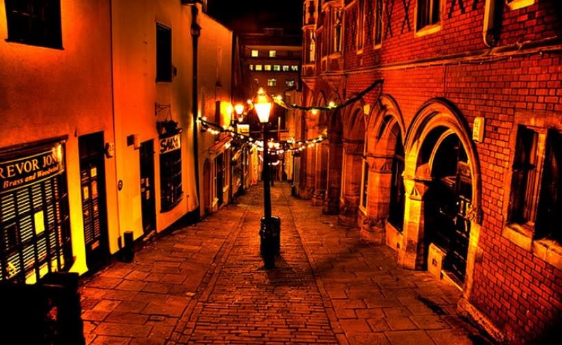 A view of Christmas Steps in central Bristol at night