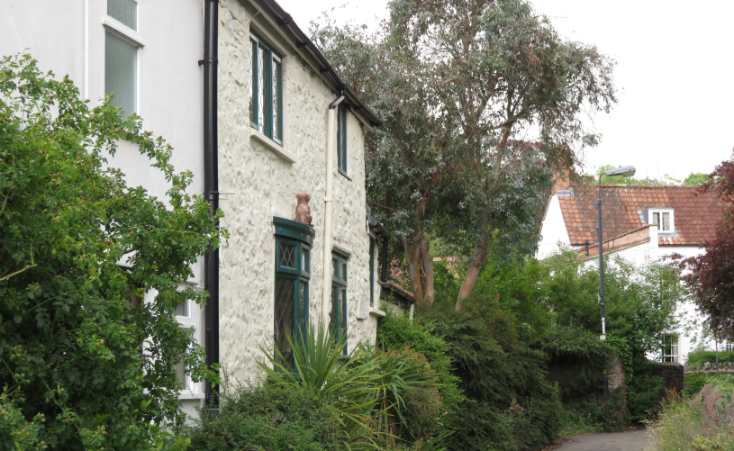 A row of white cottages in Westbury on Trym - Credit Michael Wilberforce