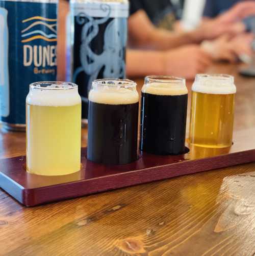 Four Ales in glasses on a table