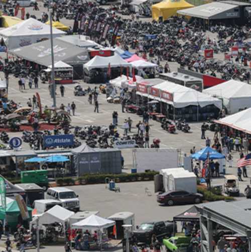 The midway at Daytona International Speedway is teeming with vendors and crowds