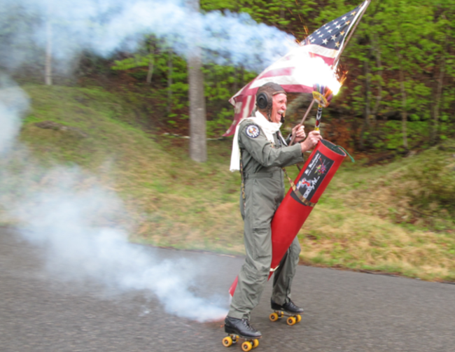 Man Rollerskating with the American Flag