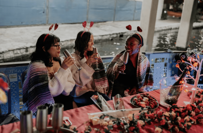 Women drinking champagne on barge