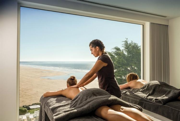 Couple getting massages at the beach front spa at Saunton Sands Hotel overlooking the beach