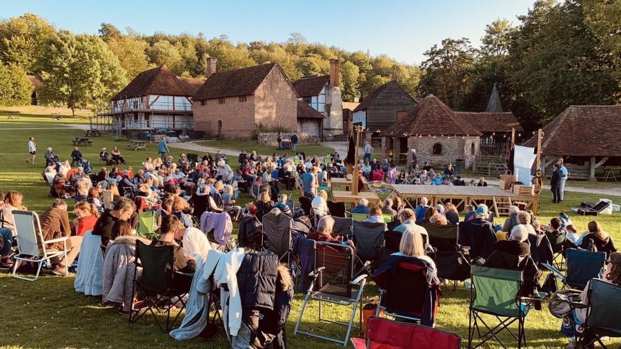 People watching open air theatre at Weald & Downland Living Museum