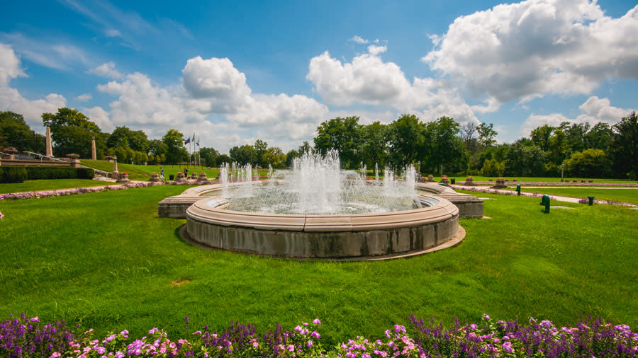 fountain underneath a blue sky