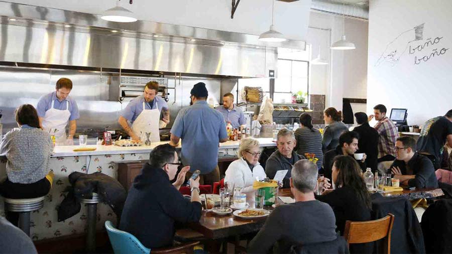 People Enjoying Brunch At Milktooth in Indianapolis