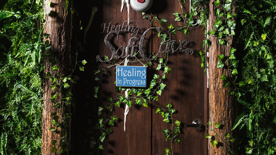 Salt Cave door, sign reads "Healing in Progress" and "Healing Salt Cave"