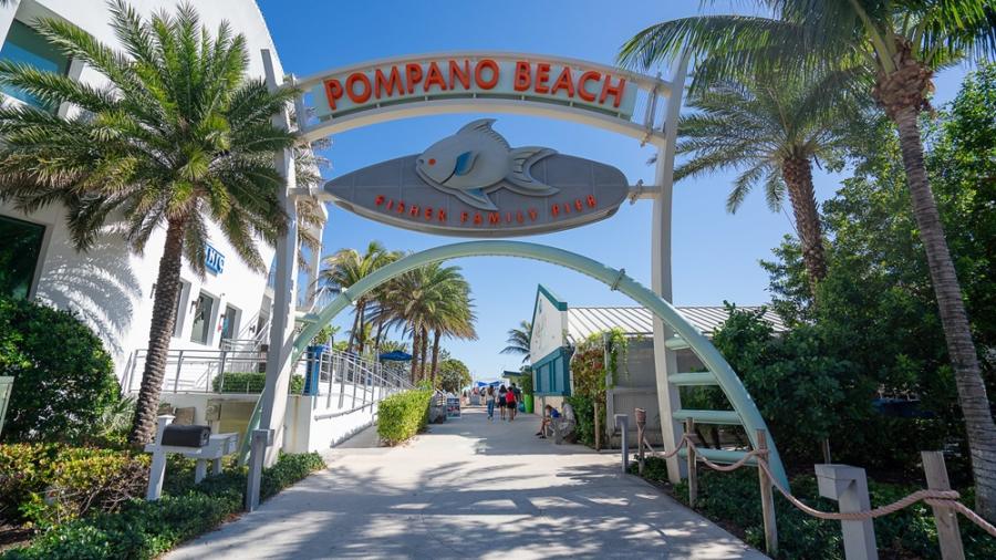 An archway at the entrance to the Pompano Beach Fisher Family Pier.