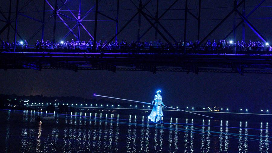illuminated wirewalker over the Susquehanna River