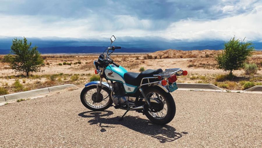 A motorcycle is parked on the West Side of Albuquerque