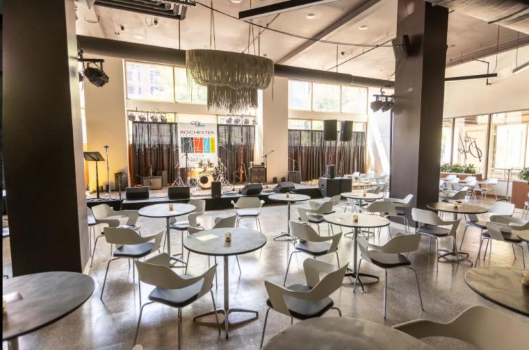 Event space filled with tables and chairs