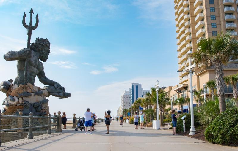 King Neptune statue on a boardwalk