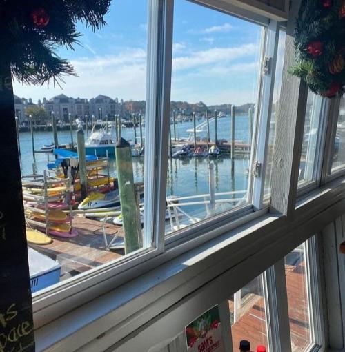 A view of a harbor from a restaurant window