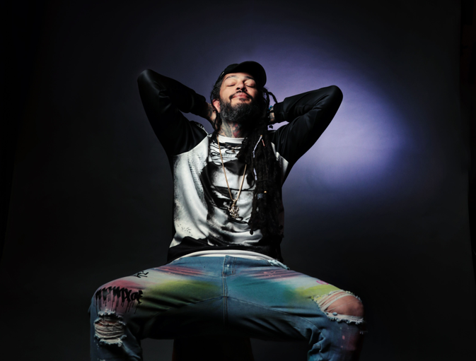 Travie McCoy the frontman for Gym Class Heroes, poses for a photo