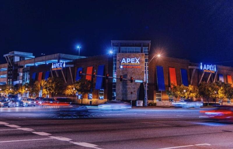 Bright lights illuminate the exterior of APEX Town Center of Virginia Beach