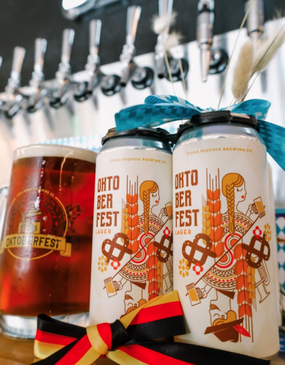 Cans of craft beer with Oktoberfest logo