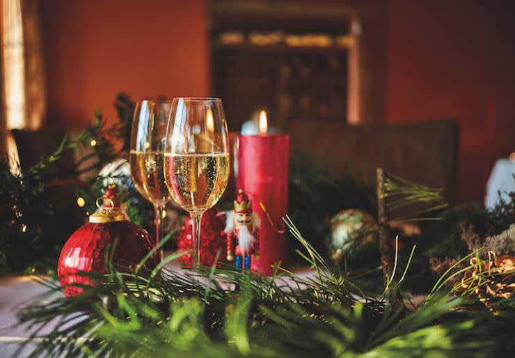 Champagne glasses in festive decorations