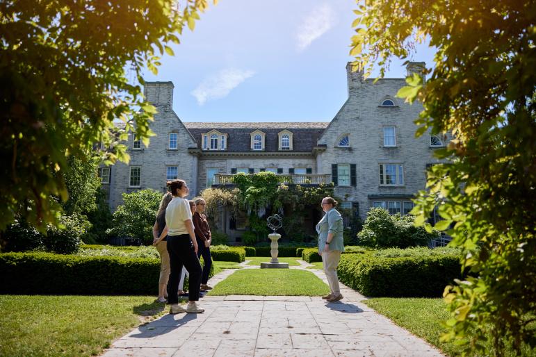 women enjoying a group tour of the george eastman museum in rochester, ny