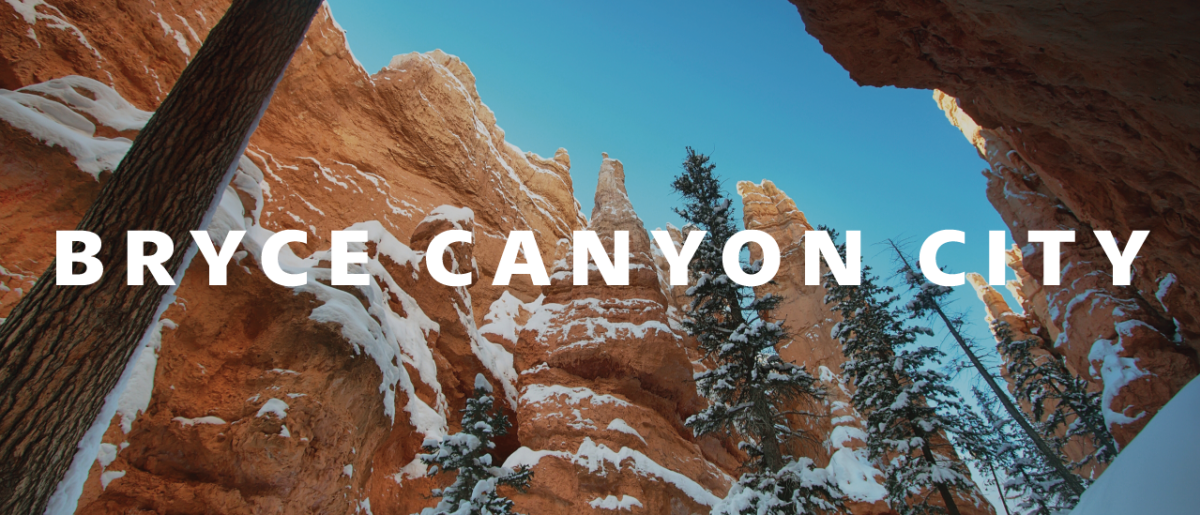Snowy Red Rocks at Bryce Canyon with Bryce Canyon City written over the top