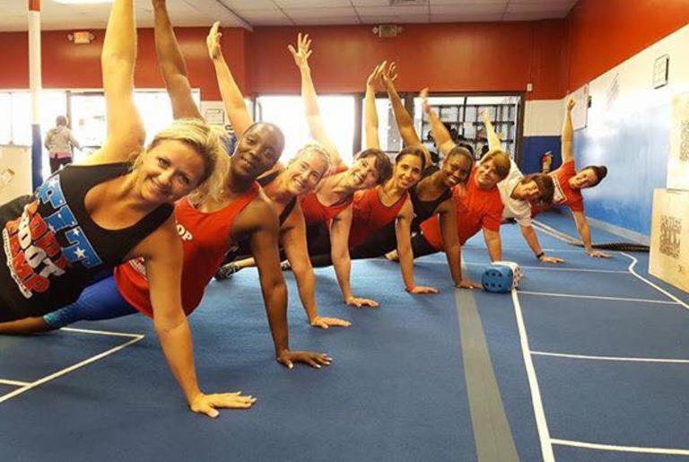 Fit Body Boot Camp in action side planks