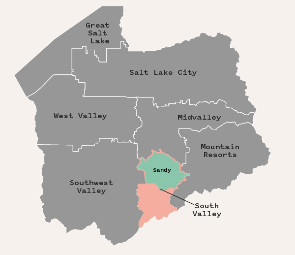 Map of Salt Lake county with South Valley area highlighted pink and Sandy highlighted green