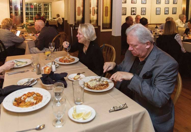 Couples having dinner inside D'Rocco's dining room