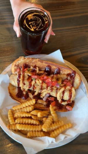 French fries, a hot dog, and soda.