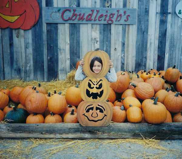 girl with pumpkins