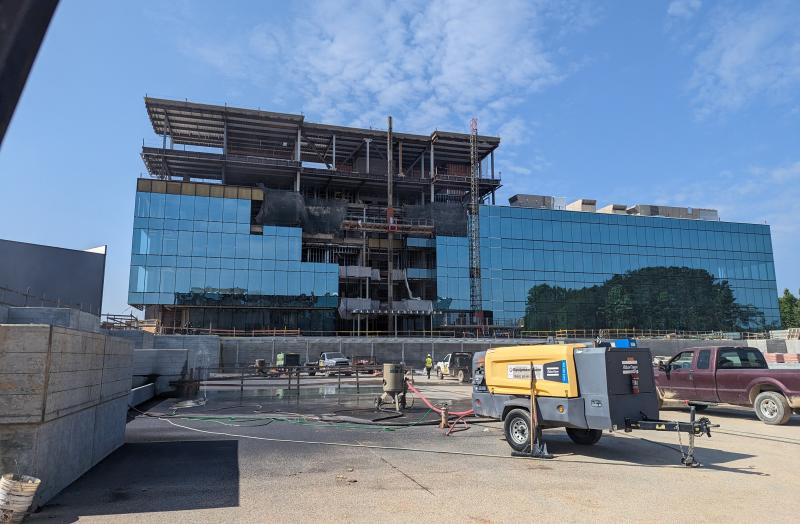 Assembly Atlanta Pond before filled with mirrored building above