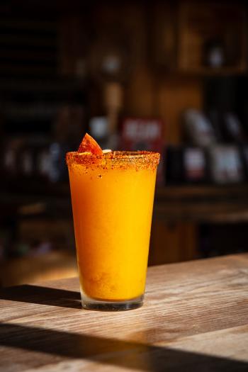 A closeup of a Michelada at Alta Baja Market 