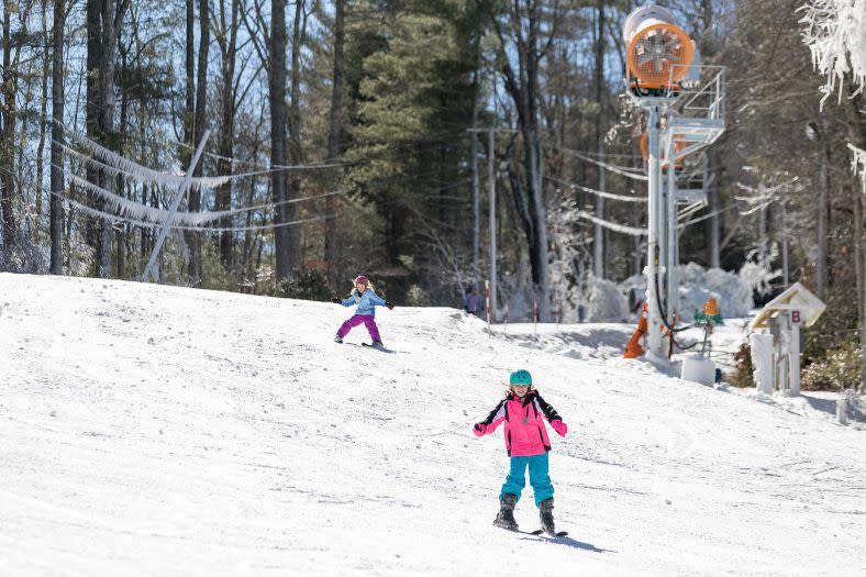 girls skiing the slopes of sapphire valley in jackson county