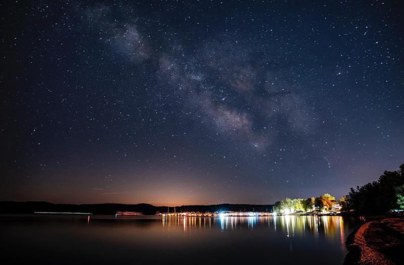 The Fourwinds Resort and Monroe Lake at night, shot from Fairfax Beach