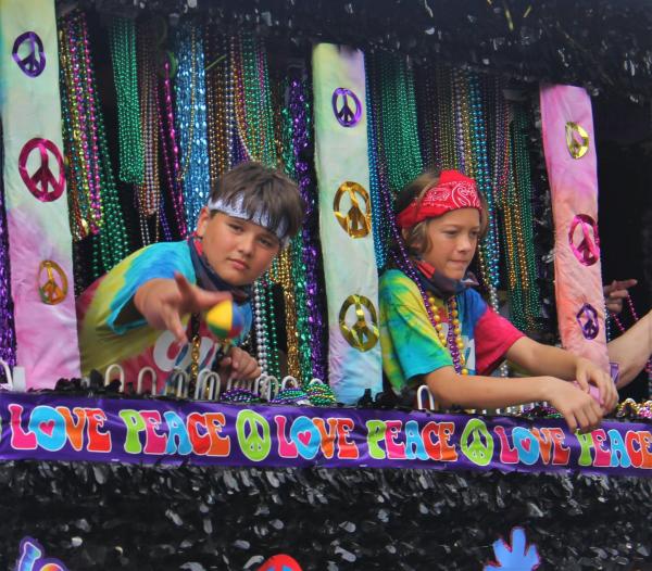 Peace and Love float in Carnival in Covington parade