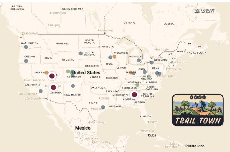 A map of North America with dots placed on various destinations within the U.S.A. indicating the IMBA Trail Town recognition for those communities and their commitment to trails and those who ride them. - 2026