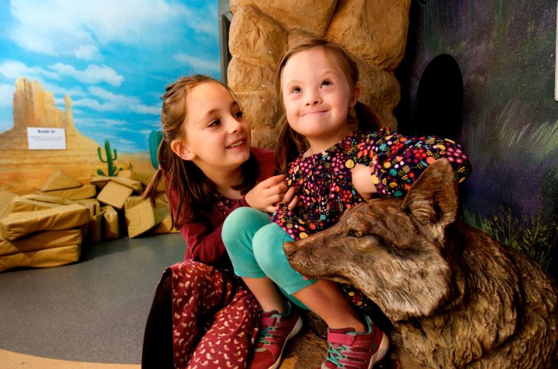 Two girls enjoying an exhibition
